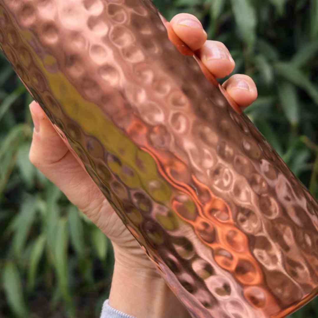 Koperen waterfles gehamerd