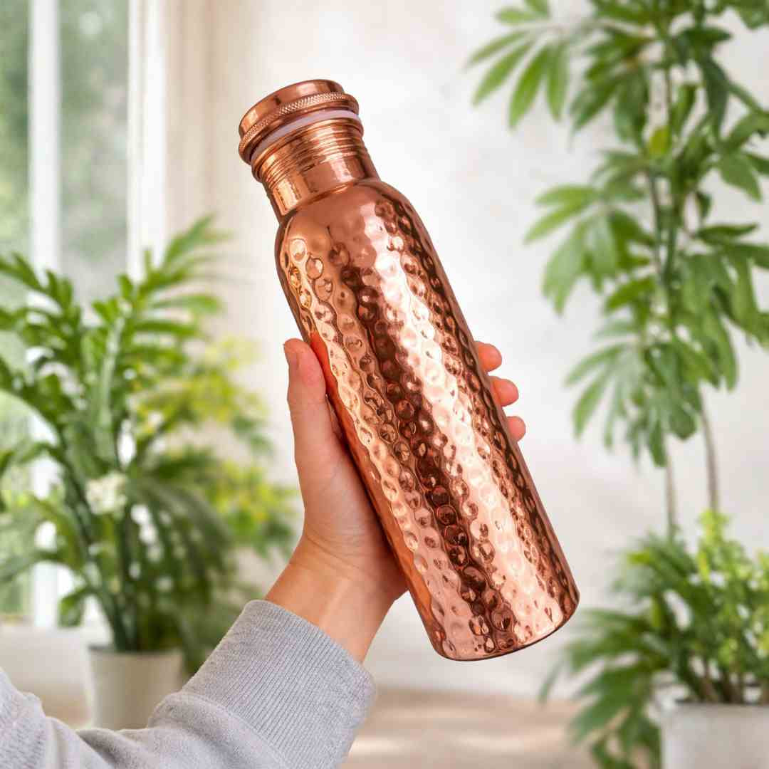 Koperen waterfles gehamerd